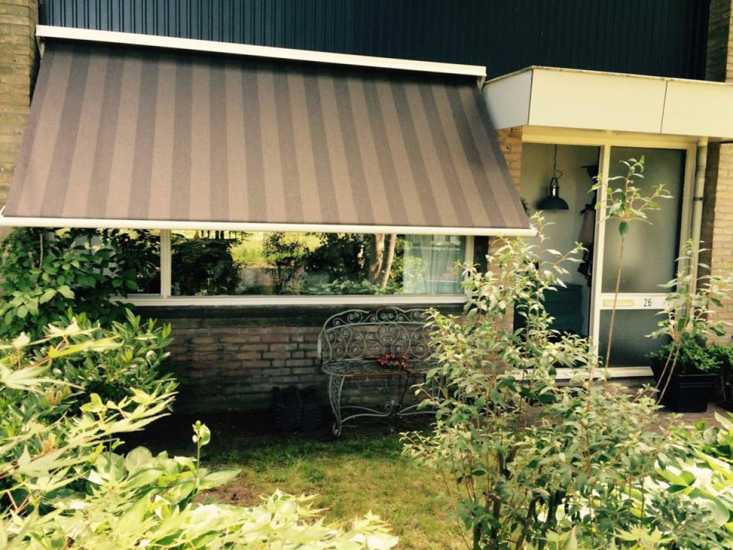Knikarmscherm en uitvalscherm